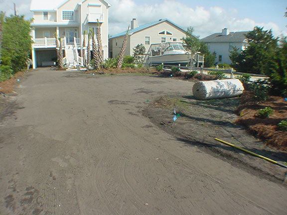 Base course preparation in driveway